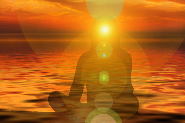 emotional healing with person sitting in yoga position